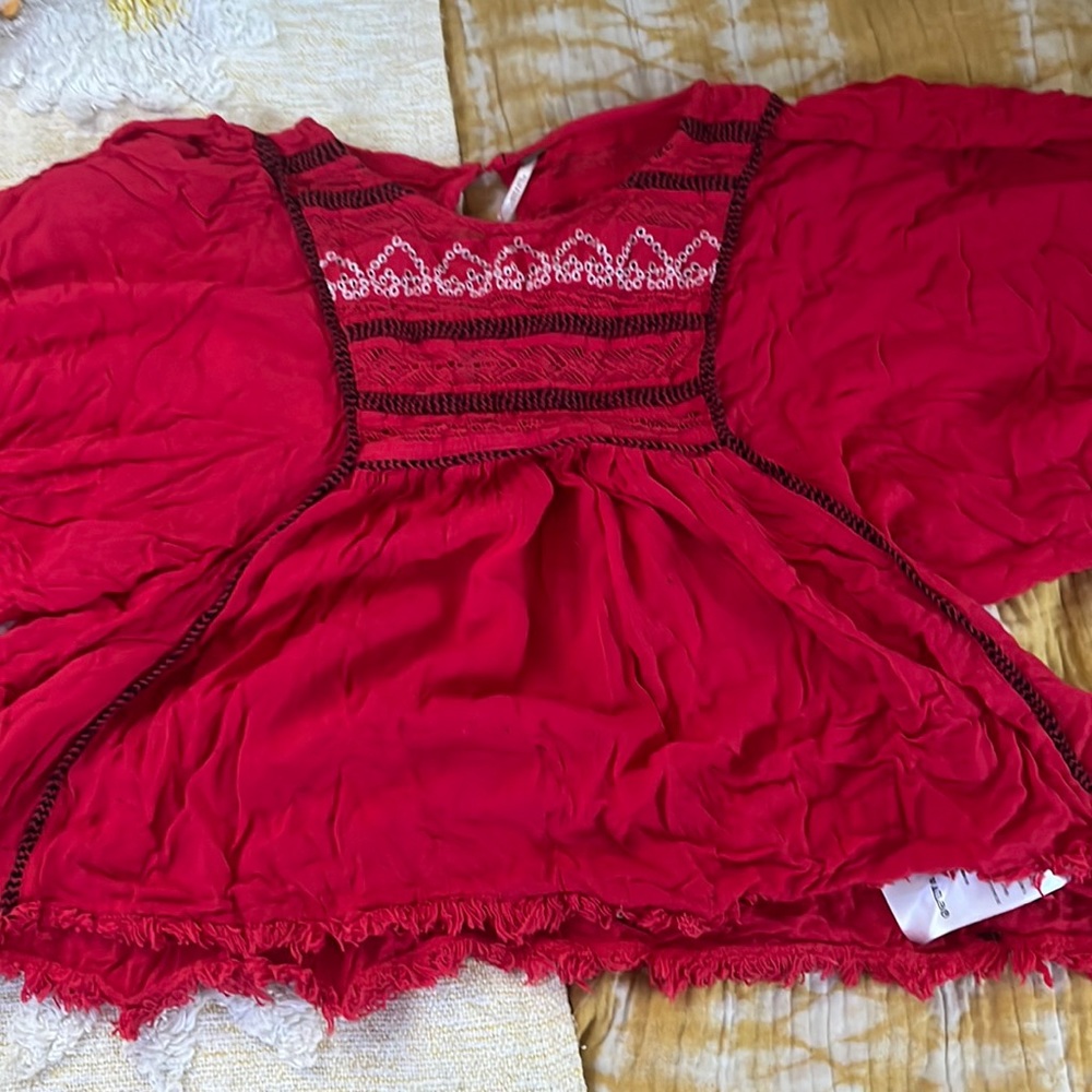Red free people shirt size small. Super cute and